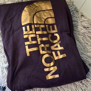 The North Face purple and gold hoodie